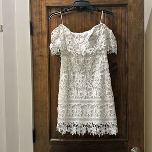 Never been worn!!!White Lace cocktail/bridal dress. Astor The Label size Small